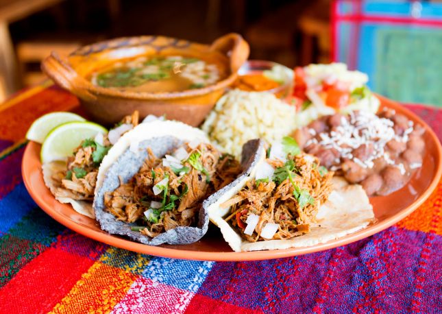 Step out of your comfort zone and have a taste of local fare.