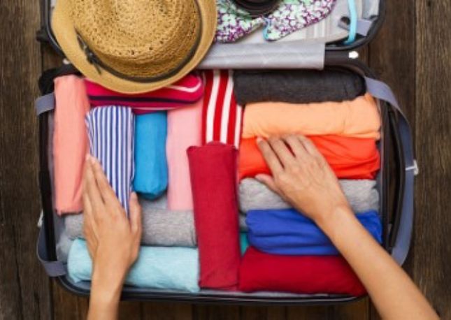 Roll your clothes to help prevent creasing.